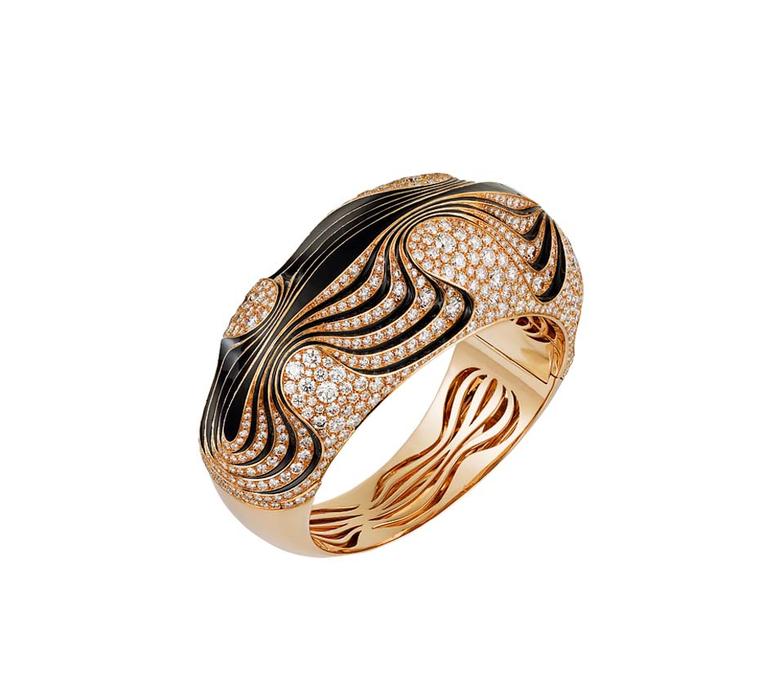The contoured patterns of water on sand are exquisitely recreated by Cartier in this gold, lacquer and diamond bracelet from the latest collection of Paris Nouvelle Vogue jewellery, launched recently in Paris.